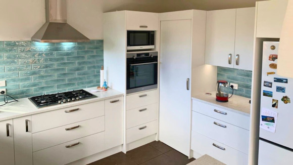 teal tile kitchen design