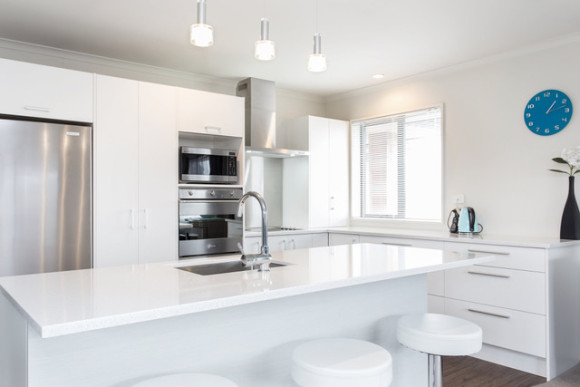 White Kitchen and Benchtop with Stainless Steel appliances
