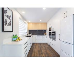 white wood feature kitchen