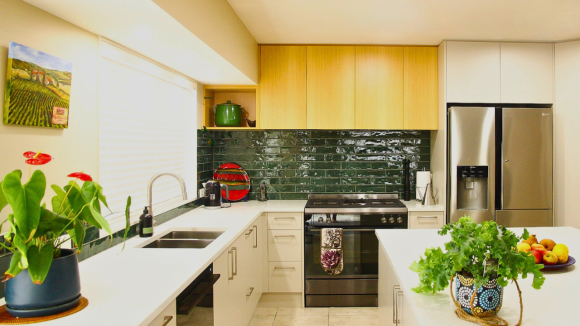 emerald green subway tile kitchen