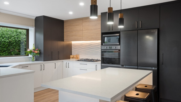contemporary kitchen renovation christchurch black cabinets white island modern lighting
