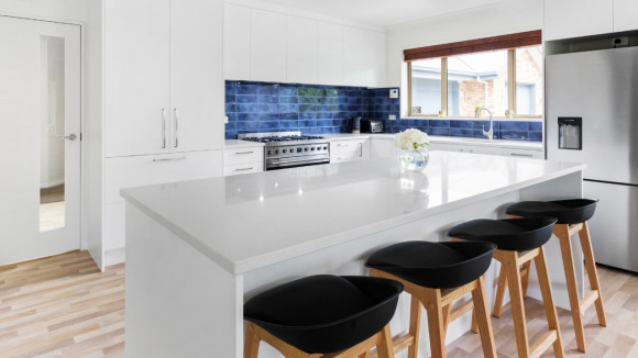 modern kitchen renovation christchurch white cabinets blue tile backsplash