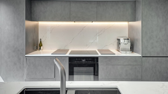 sleek modern kitchen renovation christchurch gray cabinets marble backsplash