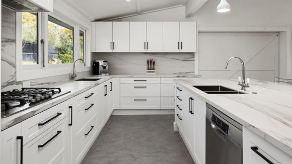 elegant kitchen renovation christchurch white cabinets marble countertops modern design