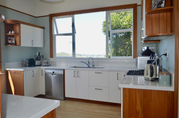 white kitchen wooden panels